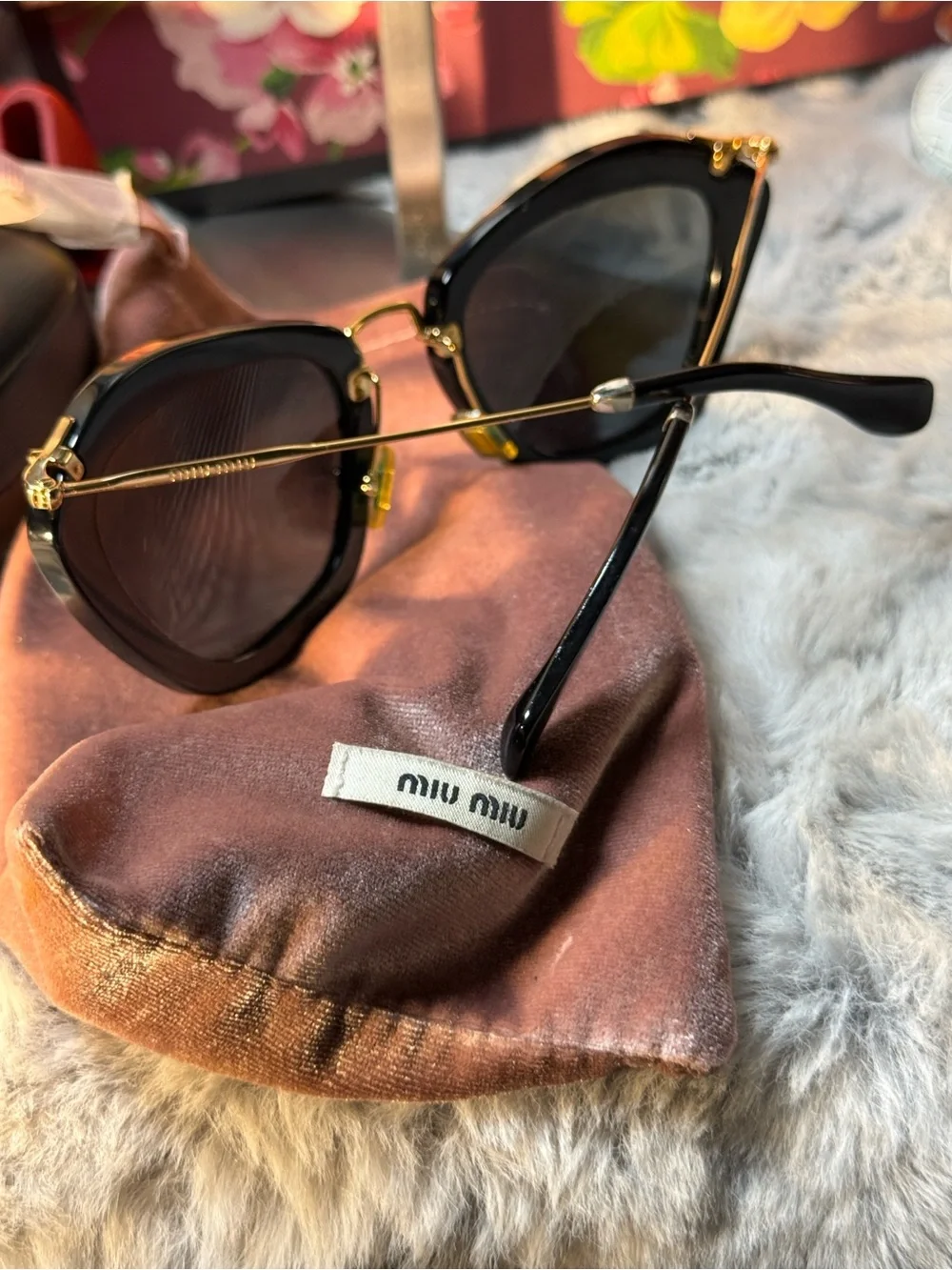 Miu Miu bold cat